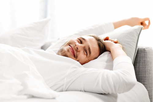 Picture,Showing,Young,Man,Stretching,In,Bed - Sexual Performance Anxiety