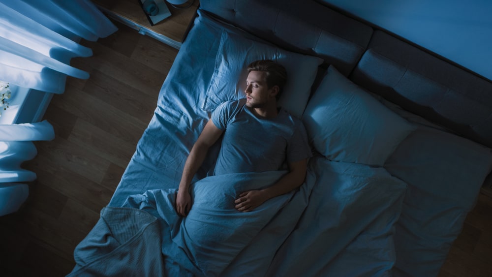 a man getting a full night rest.