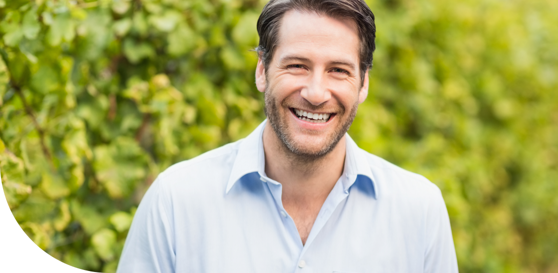 smiling man outside