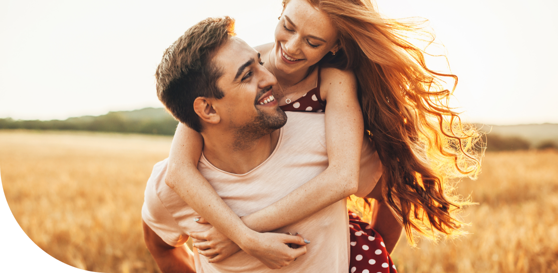 young couple in field
