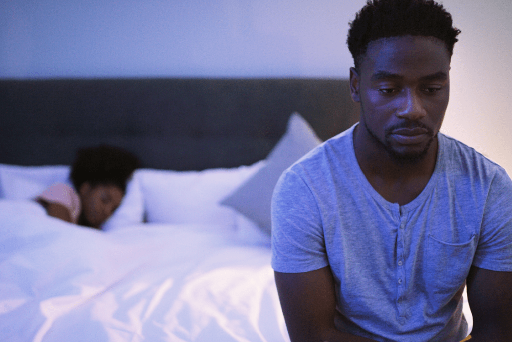 couple mad at each other in bedroom